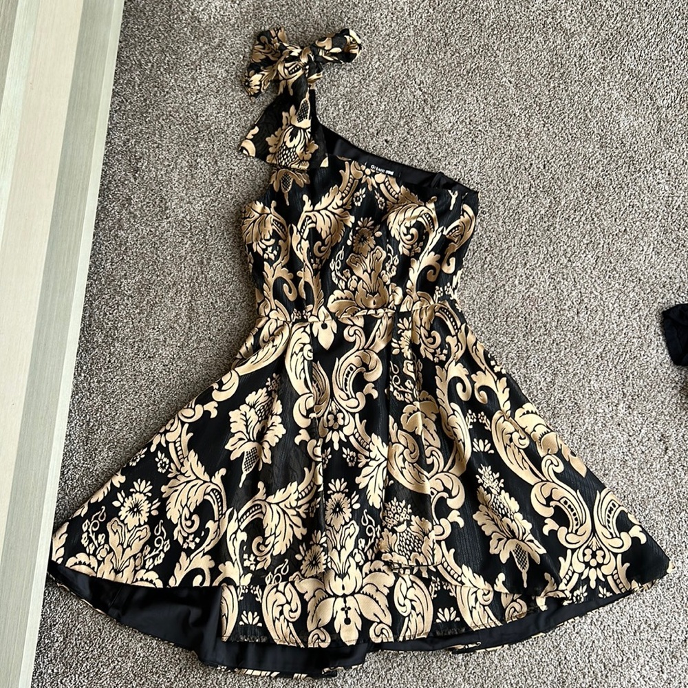 Gianni Bini. Black and gold. After 5pm cocktail dress. One shoulder.